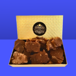 Opened box of toffee w blue background